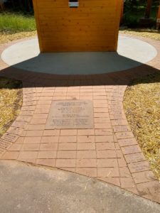 A walkway flanked with commemorative carved bricks leads the way to the base of Eagle Tower.